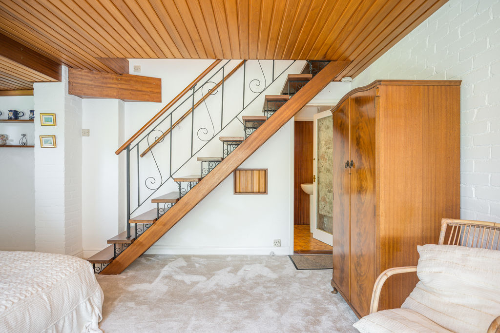 Stairs down to Bedroom- click for photo gallery